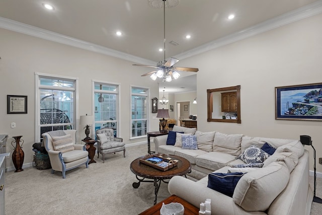 carpeted living room featuring ceiling fan with notable chandelier and ornamental molding