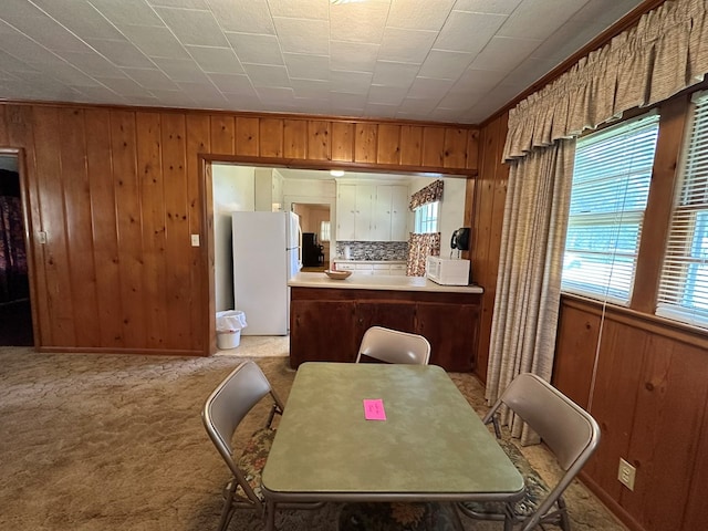 111 Helen St, Dothan, AL 36301 - dining room with wooden walls and light carpet