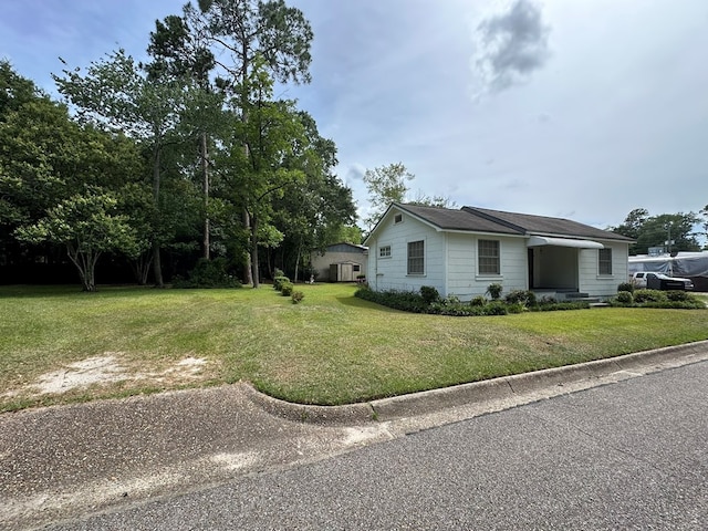 111 Helen St, Dothan, AL 36301 - view of home's exterior with a lawn
