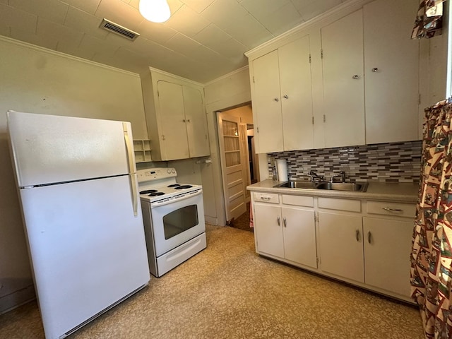 111 Helen St, Dothan, AL 36301 - kitchen featuring white appliances, a sink, tasteful backsplash, light countertops, and crown molding