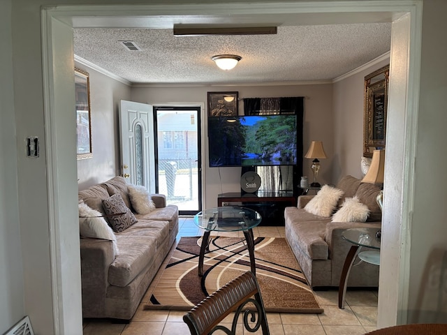 living room with light tile patterned floors, visible vents, crown molding, and a textured ceiling