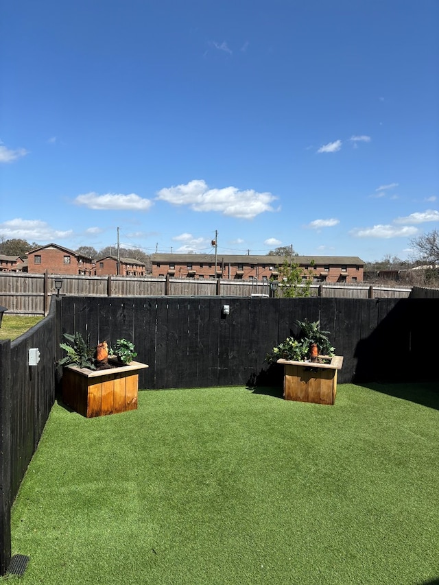 view of yard featuring fence