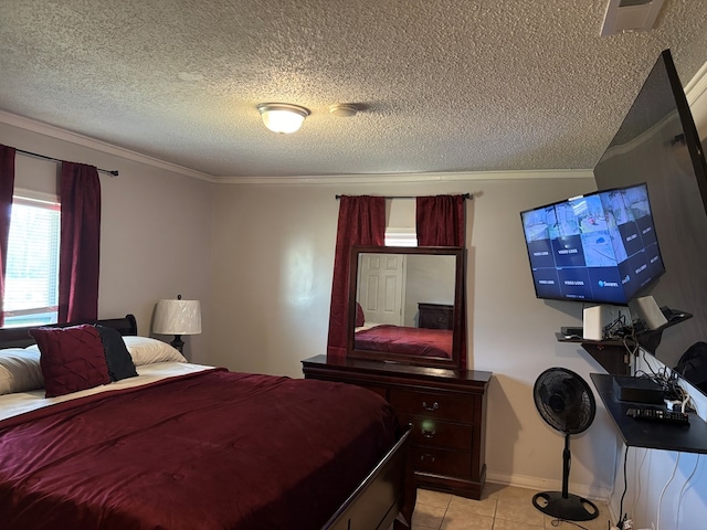bedroom featuring ornamental molding, a textured ceiling, light tile patterned floors, and visible vents