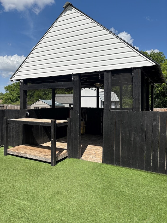 view of yard with a gazebo and fence