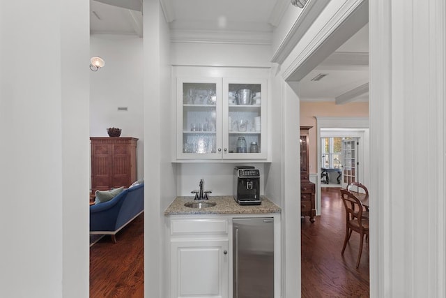 205 Marigold Ln, Dothan, AL 36305 - indoor wet bar featuring stainless steel fridge, crown molding, and dark wood-type flooring