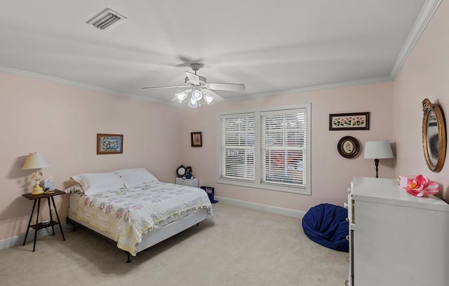 bedroom with carpet flooring, ceiling fan, and ornamental molding