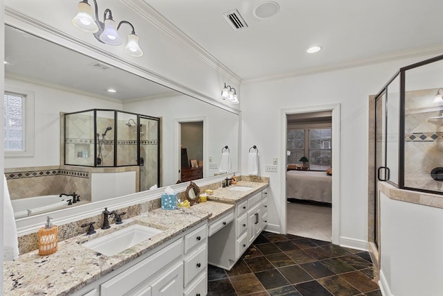 bathroom featuring vanity, ornamental molding, and independent shower and bath