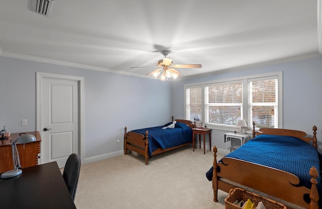 carpeted bedroom featuring ceiling fan and ornamental molding