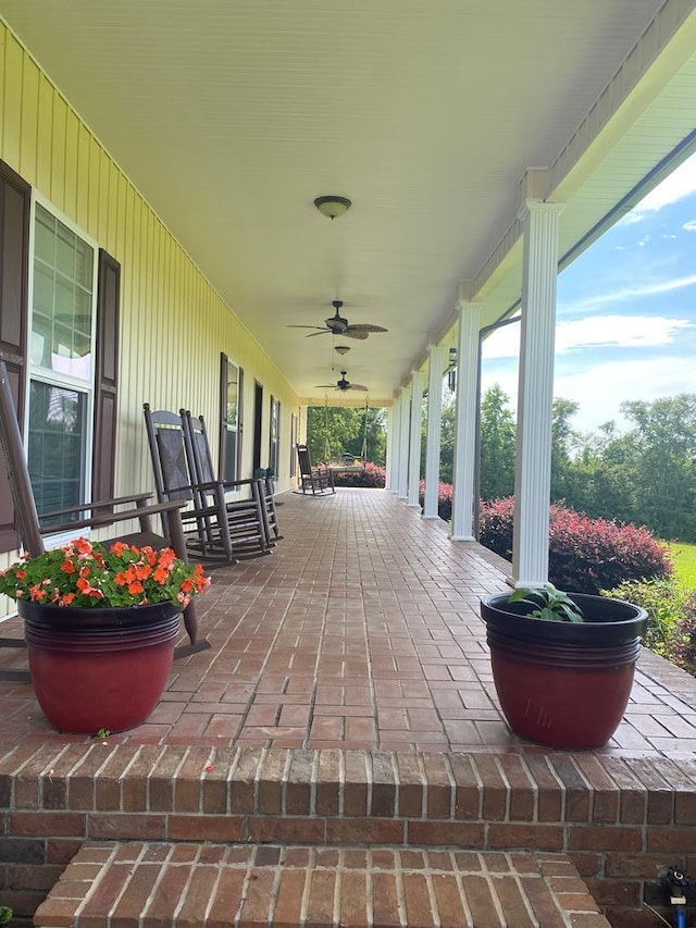 view of patio / terrace with ceiling fan and covered porch