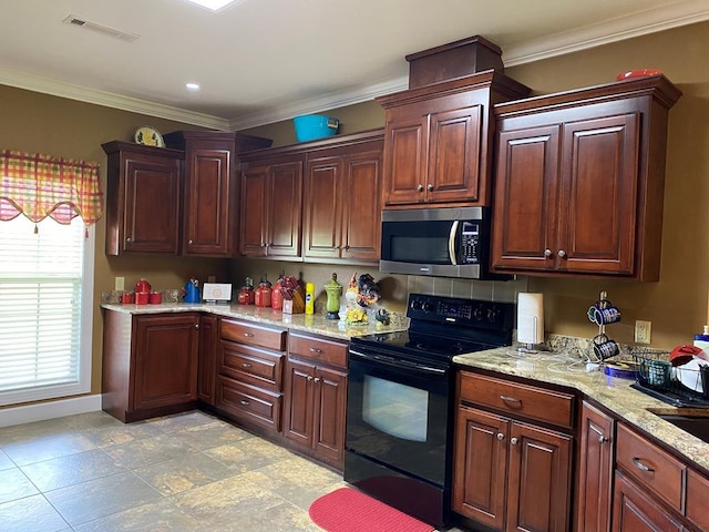 kitchen with ornamental molding, light stone countertops, and electric range