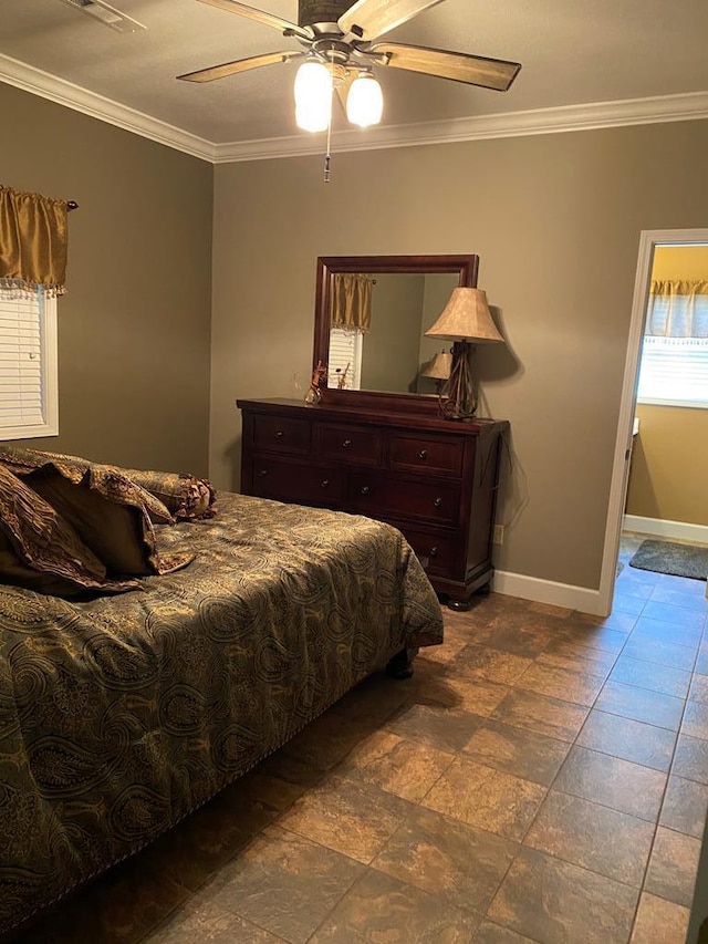 bedroom featuring crown molding and ceiling fan