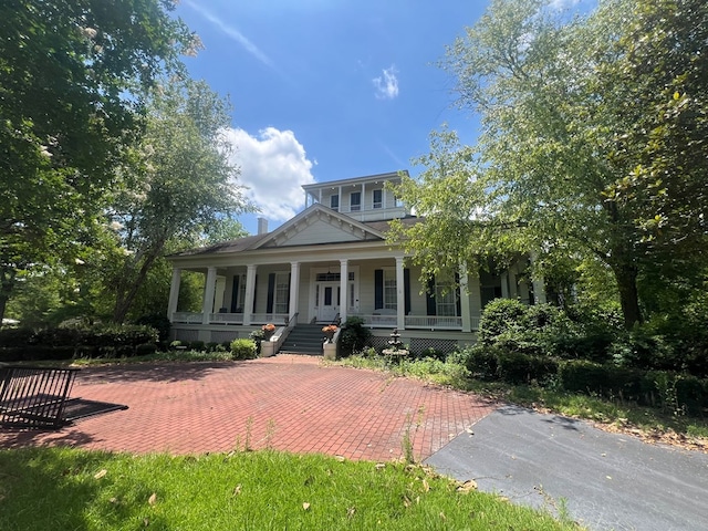 view of front of home featuring covered porch