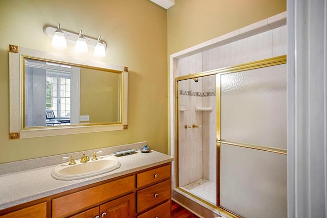 bathroom with vanity and walk in shower