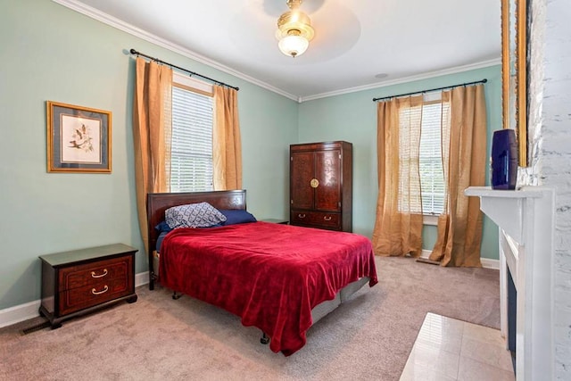 bedroom with ceiling fan, crown molding, and light carpet