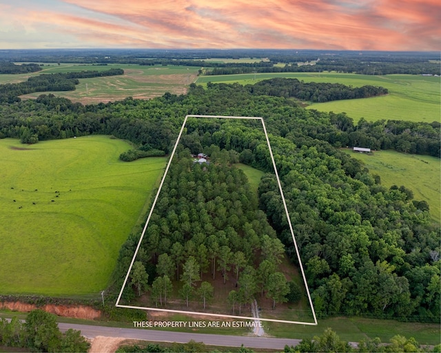 aerial view at dusk with a rural view