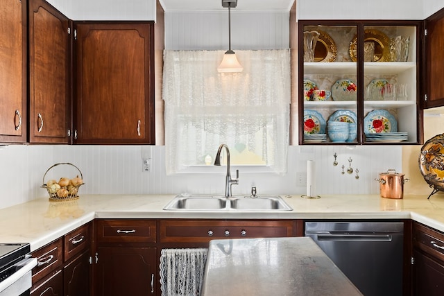 kitchen with sink, pendant lighting, and appliances with stainless steel finishes