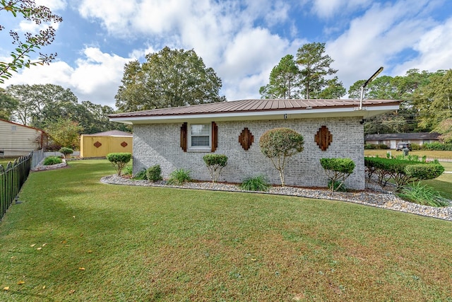 view of home's exterior featuring a yard