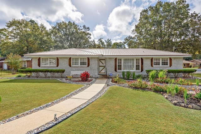 single story home with a front yard