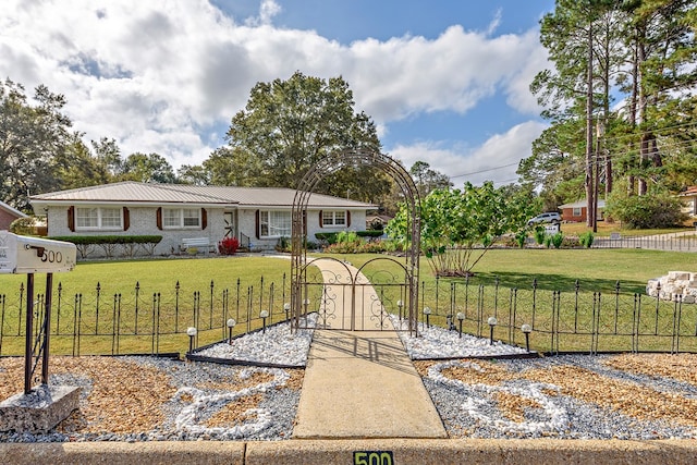 view of front facade with a front yard