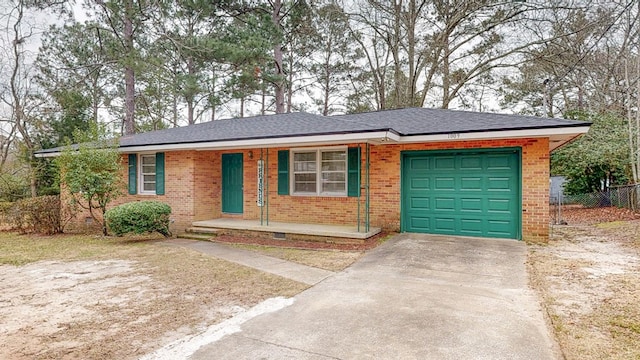 ranch-style home featuring a garage