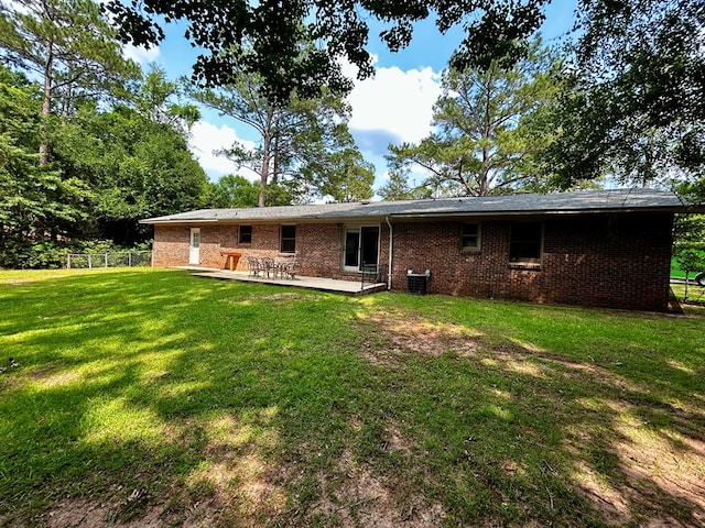 1002 Monterey Ct, Dothan, AL 36303 - back of property with central air condition unit and brick siding