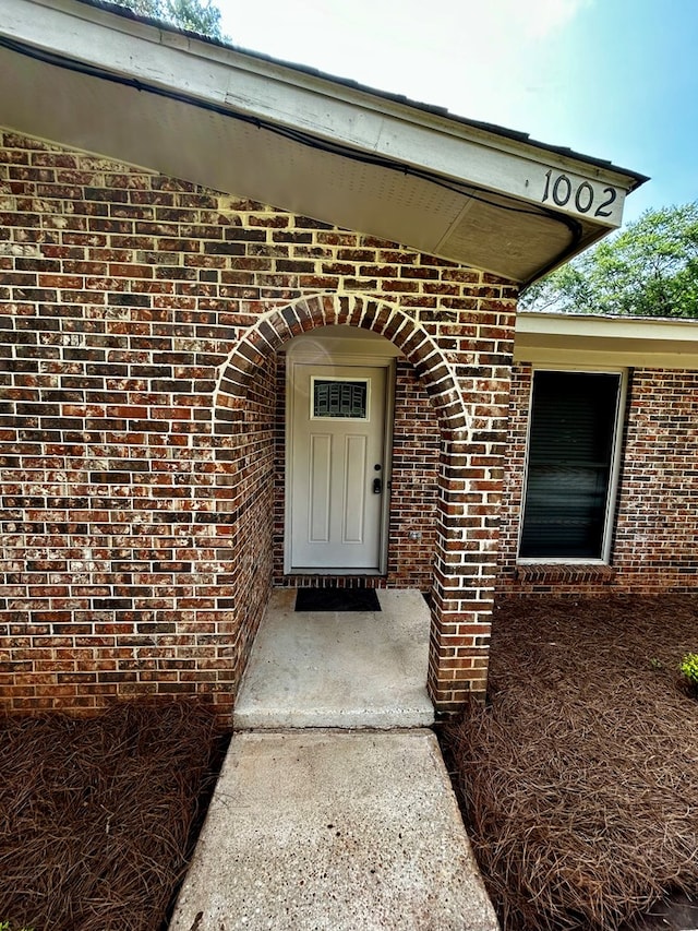 1002 Monterey Ct, Dothan, AL 36303 - view of exterior entry featuring brick siding