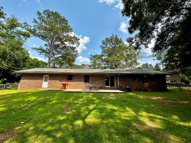 1002 Monterey Ct, Dothan, AL 36303 - back of house featuring a patio area, central air condition unit, and brick siding