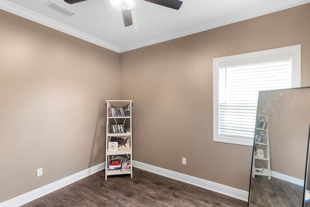 1913 W Malvern Hwy, Slocomb, AL 36375 - unfurnished room with a ceiling fan, dark wood-style floors, crown molding, and baseboards