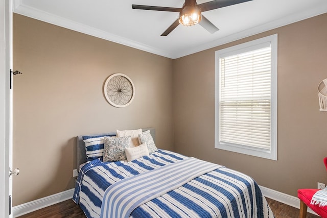 1913 W Malvern Hwy, Slocomb, AL 36375 - bedroom featuring baseboards, dark wood-type flooring, crown molding, and ceiling fan