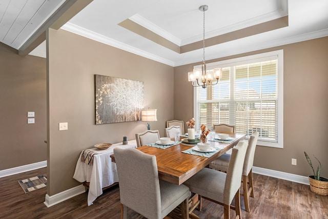 1913 W Malvern Hwy, Slocomb, AL 36375 - dining area with a chandelier, wood finished floors, baseboards, and ornamental molding
