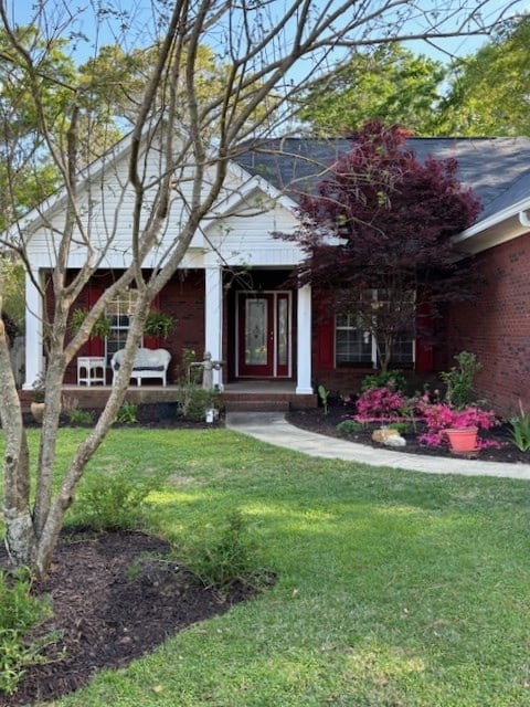 109 Talquin Ct, Dothan, AL 36301 - view of front of house with a front lawn