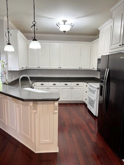 109 Talquin Ct, Dothan, AL 36301 - kitchen featuring black fridge with ice dispenser, range with two ovens, a peninsula, dark countertops, and dark wood-style flooring
