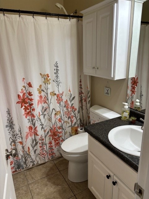 109 Talquin Ct, Dothan, AL 36301 - bathroom featuring tile patterned floors, a shower with shower curtain, toilet, and vanity