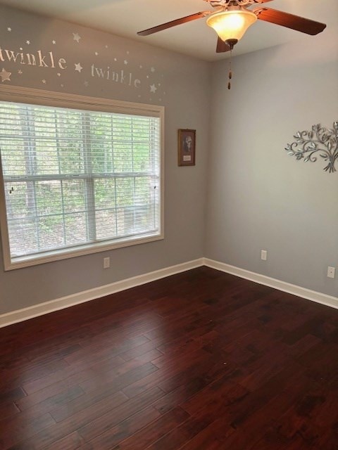 109 Talquin Ct, Dothan, AL 36301 - spare room with dark wood-type flooring, baseboards, and ceiling fan