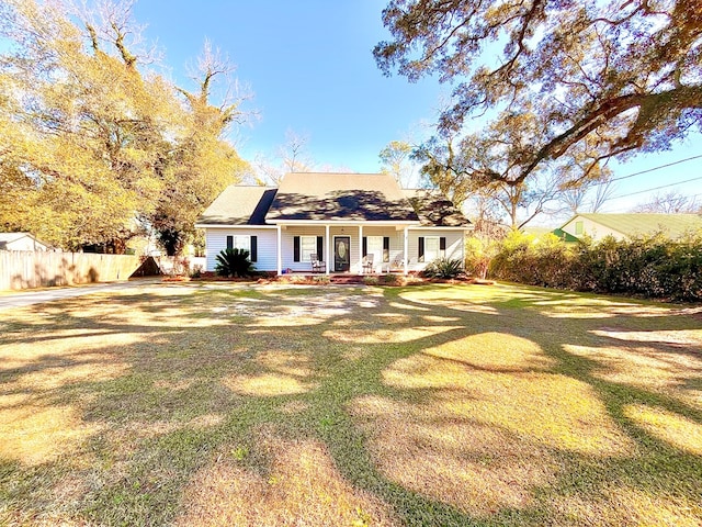 view of front of house featuring a porch and a front yard