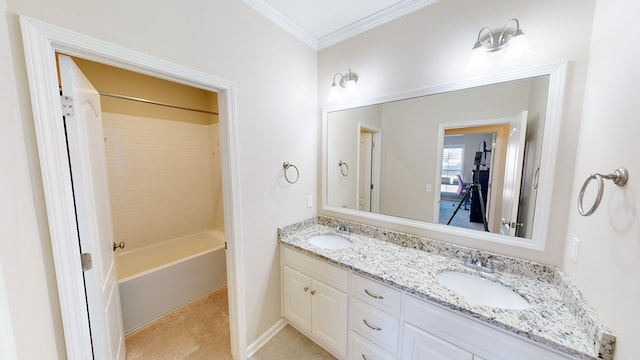 bathroom with tile patterned flooring, crown molding, vanity, and  shower combination