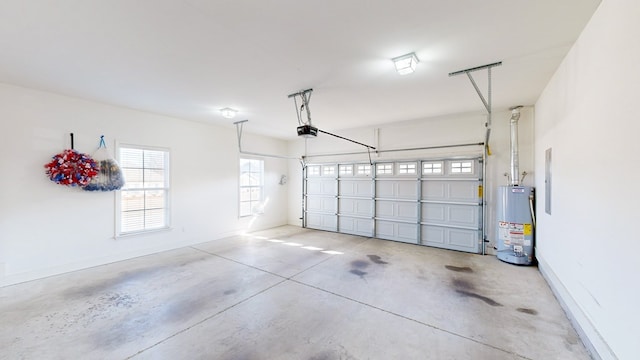 garage with water heater and a garage door opener