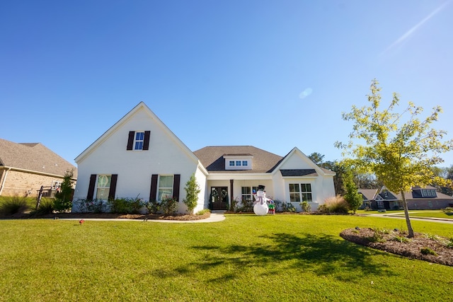 view of front facade with a front yard