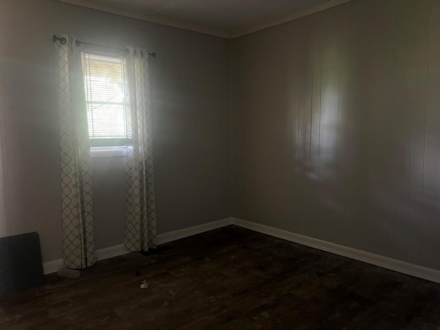 empty room with dark wood-type flooring