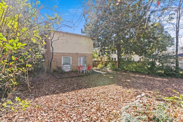 rear view of house with a patio