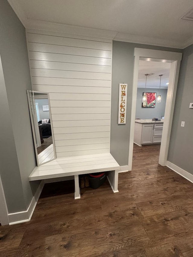 1180 Sandbed Rd, Newton, AL 36352 - hallway featuring crown molding, dark wood finished floors, and baseboards