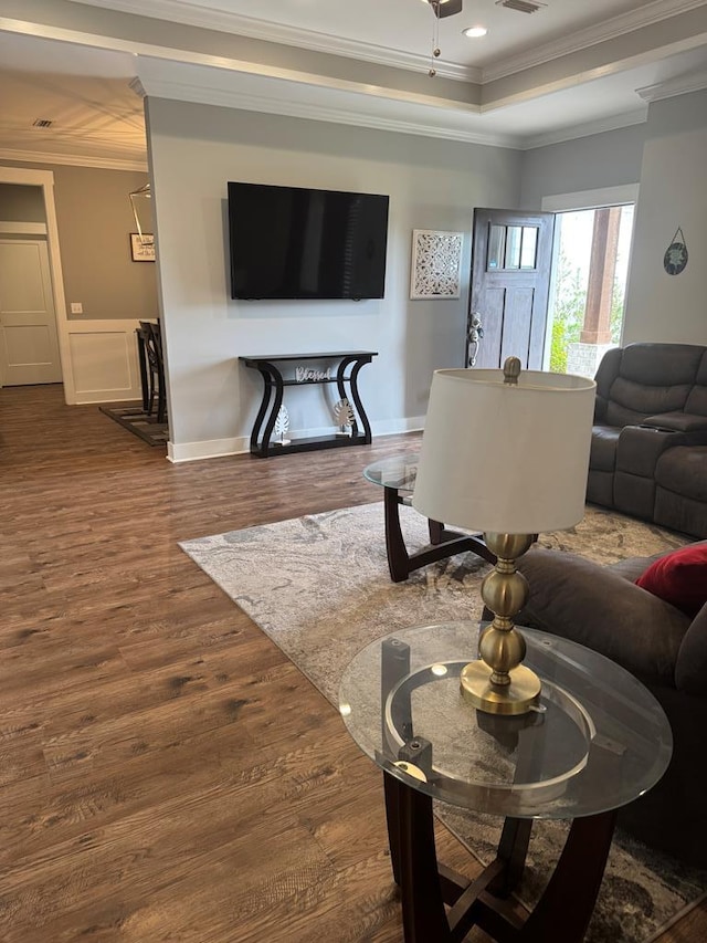 1180 Sandbed Rd, Newton, AL 36352 - living area with crown molding, wood finished floors, a wainscoted wall, and ceiling fan
