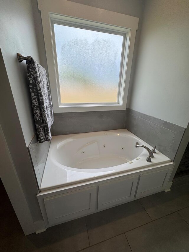 1180 Sandbed Rd, Newton, AL 36352 - bathroom featuring a whirlpool tub and tile patterned floors