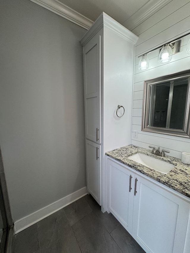 1180 Sandbed Rd, Newton, AL 36352 - bathroom with ornamental molding, vanity, and baseboards