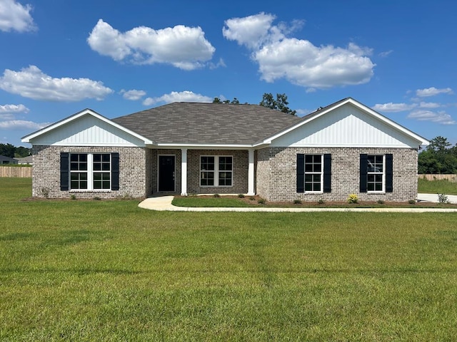 view of front of home with a front yard