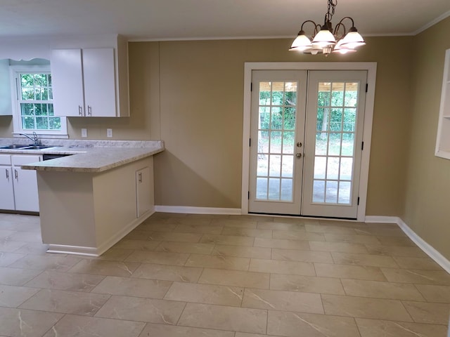 1103 Sassar St, Dothan, AL 36301 - entryway featuring a sink, french doors, baseboards, and crown molding