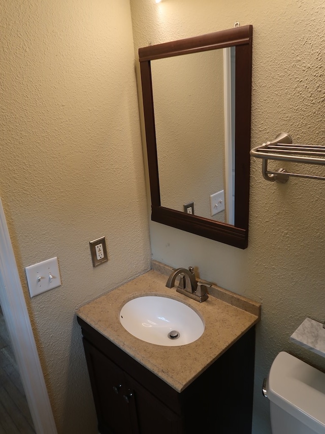 1103 Sassar St, Dothan, AL 36301 - bathroom featuring vanity and toilet