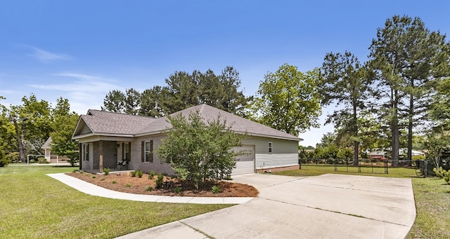 view of side of property featuring fence, an attached garage, brick siding, concrete driveway, and a lawn
