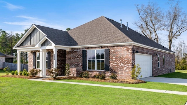 600 Golden Oaks Cir, Rehobeth, AL 36301 - view of front facade with concrete driveway, brick siding, a front lawn, a shingled roof, and a garage