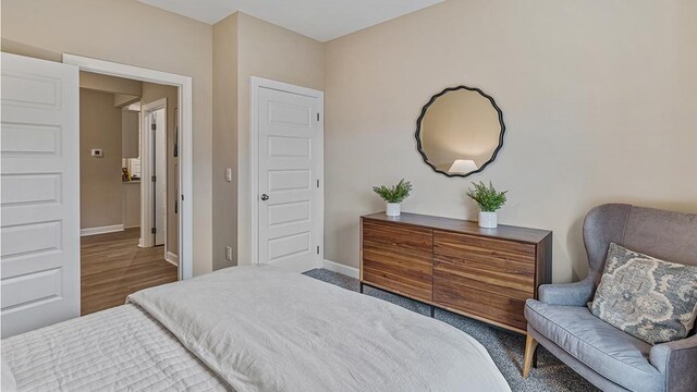 600 Golden Oaks Cir, Rehobeth, AL 36301 - bedroom featuring baseboards and wood finished floors
